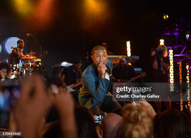 Singer Pharrell attends the new Myspace launch event at the El Rey Theatre on June 12, 2013 in Los Angeles, California.