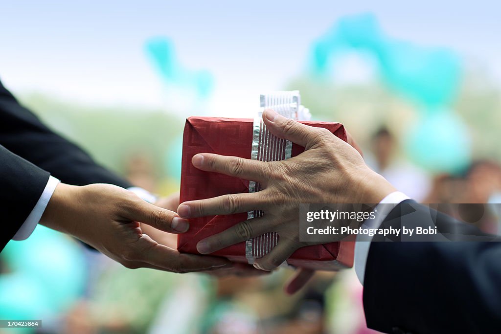 The man took over the gift from his father