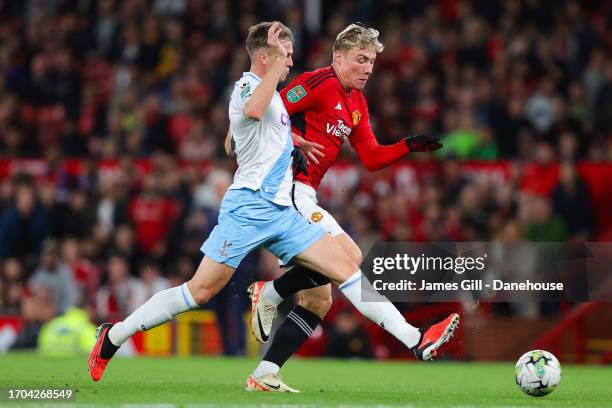 Rasmus Hojlund of Manchester United battles for possession with Rob Holding of Crystal Palace during the Carabao Cup Third Round match between...