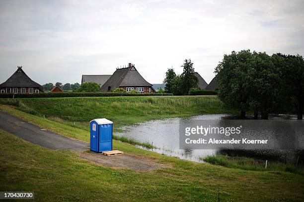 Portable toilet is pictured close to the river Elbe on June 13, 2013 in Darchau, Germany. The region around Neuhausen and Hitzacker, Lower Saxony,...