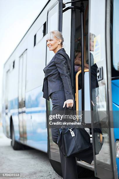 Getting Off 7,284 People Getting Off Bus Stock Photos, High-Res Pictures, and ...
