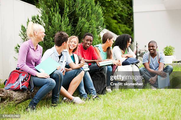 group of teenage students enjoying outside. - summer school stock pictures, royalty-free photos & images