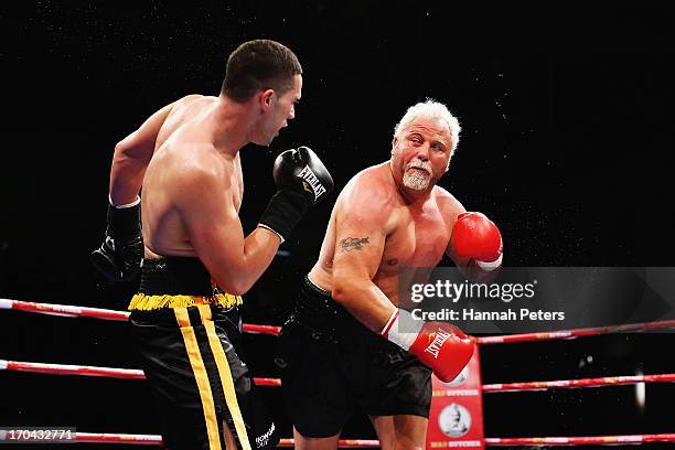 Joseph Parker of New Zealand fights Francois Botha of South Africa during the Heavyweight Title fight at Trusts Stadium on June 13, 2013 in Auckland,...
