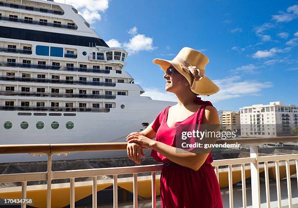 smiling woman in cruise vacation - cruise ship dock stock pictures, royalty-free photos & images