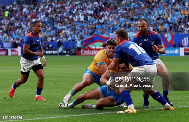 Baltazar Amaya of Uruguay scores his team's first try during the Rugby World Cup France 2023 match between Uruguay and Namibia at Parc Olympique on...