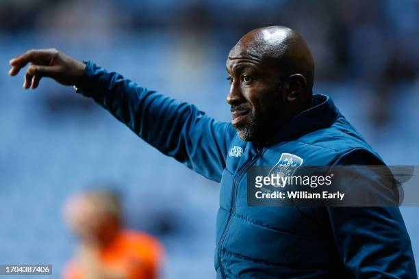 Darren Moore the manager of Huddersfield Town gives instructions during the Sky Bet Championship match between Coventry City and Huddersfield Town at...