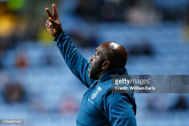 Darren Moore the manager of Huddersfield Town gives instructions during the Sky Bet Championship match between Coventry City and Huddersfield Town at...