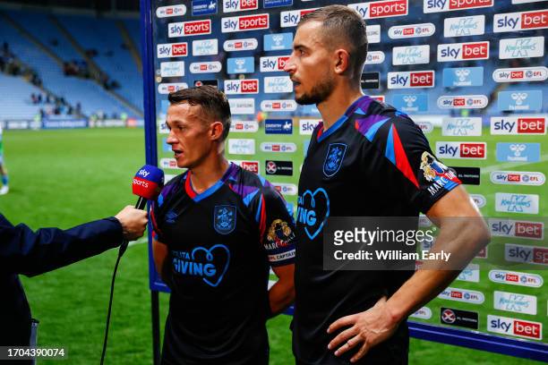 Jonathan Hogg and Michal Helik of Huddersfield Town in a post match interview after the Sky Bet Championship match between Coventry City and...