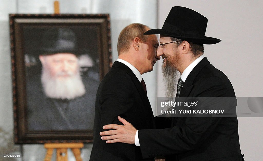 Putin With Rabbis Russia's President Vladimir Putin hugs Russia's chief Rabbi Berel ...