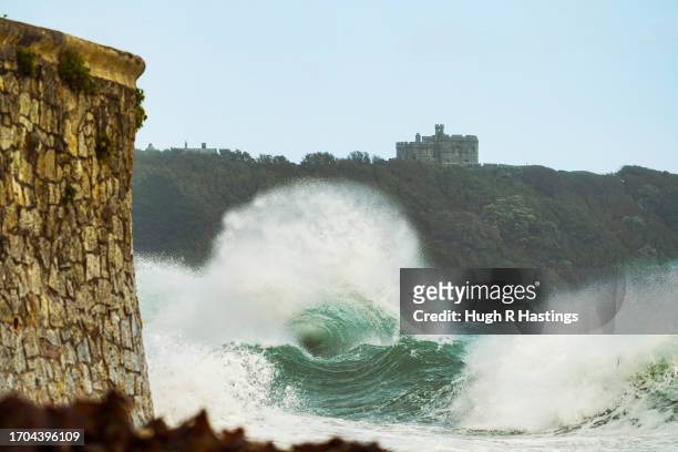 Large waves reach the shoreline near Pendennis Castle at Gylllyngvase Beach on September 27, 2023 in Falmouth, Cornwall, England.