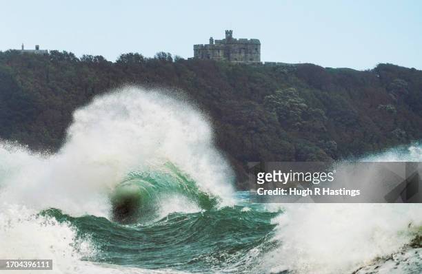 Large waves reach the shoreline near Pendennis Castle at Gylllyngvase Beach on September 27, 2023 in Falmouth, Cornwall, England.
