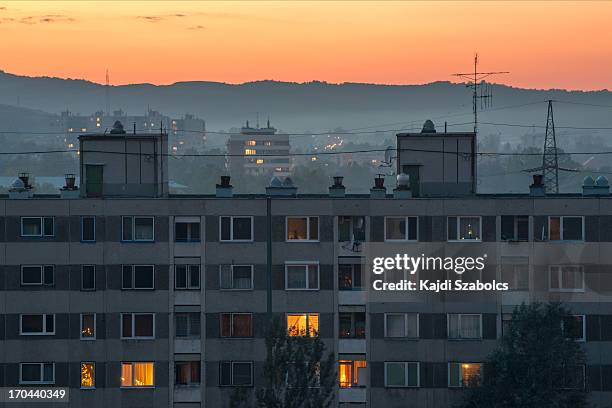 city at sunset - smog hungary stock pictures, royalty-free photos & images