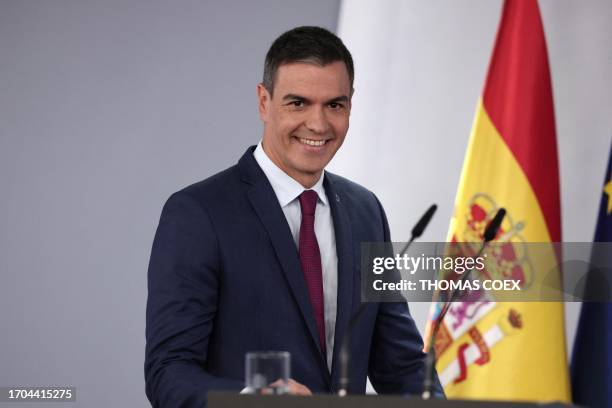 Spain's acting Prime Minister Pedro Sanchez delivers a speech at La Moncloa Palace in Madrid on October 3, 2023 after meeting King Felipe VI as part...