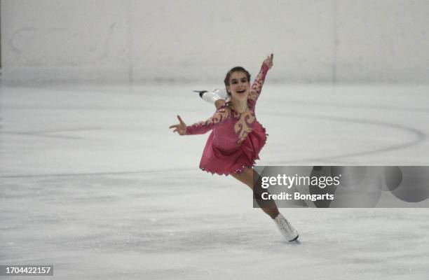 German figure skater Katarina Witt performs her routine on the ice during the ladies' singles competition of the 1984 European Figure Skating...