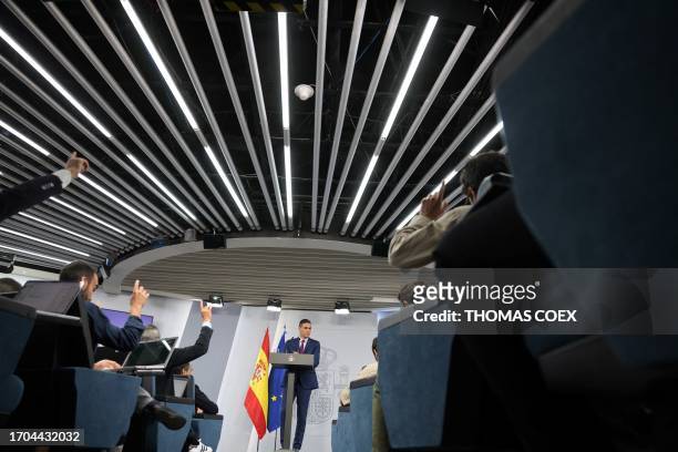 Spain's acting Prime Minister Pedro Sanchez answers to media's questions at La Moncloa Palace in Madrid on October 3, 2023 after meeting King Felipe...