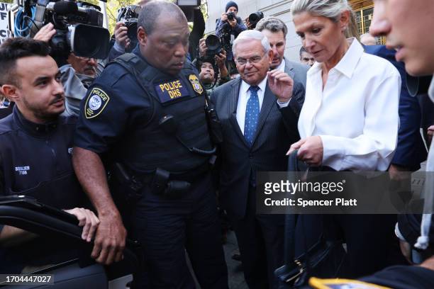 Senator Bob Menendez and his wife Nadine Menendez depart a Manhattan court after they were arraigned on federal bribery charges on September 27, 2023...