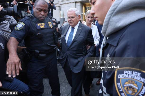 Senator Bob Menendez and his wife Nadine Menendez depart a Manhattan court after they were arraigned on bribery charges on September 27, 2023 in New...