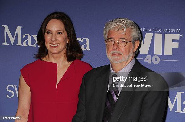 Producer Kathleen Kennedy and producer/director George Lucas attend Women In Film's 2013 Crystal + Lucy Awards at The Beverly Hilton Hotel on June...