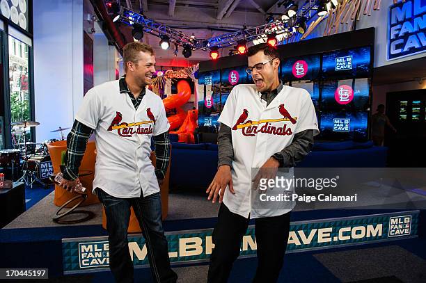 Trevor Rosenthal and Joe Kelly of the St. Louis Cardinals joke with one another at the MLB Fan Cave Wednesday, June 12 at Broadway and 4th Street in...