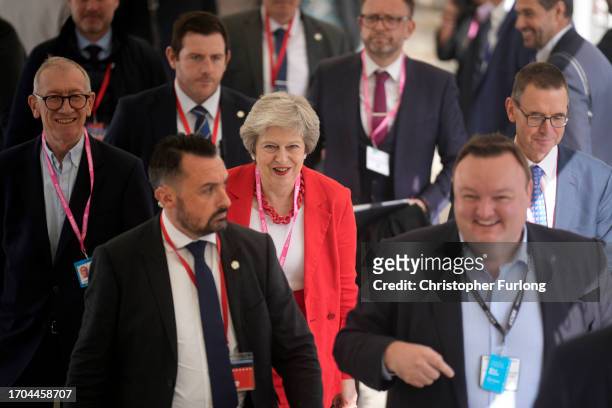 Former prime minister Theresa May and husband Philip May attends the third day of the Conservative Conference on October 03, 2023 in Manchester,...