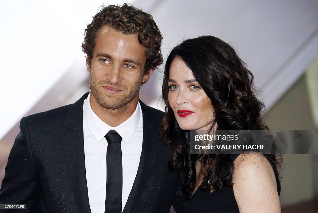 US actress Robin Tunney poses with her husband during the closing