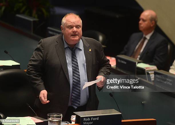 Mayor Rob Ford in Council Chambers talking to councillors about seniors and housing. Earlier today Toronto Police launched massive predawn raid, as...