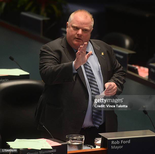 Mayor Rob Ford in Council Chambers talking to councillors about seniors and housing. Earlier today Toronto Police launched massive predawn raid, as...