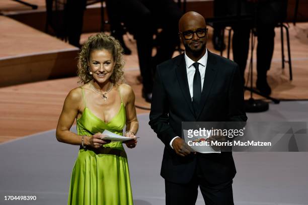 Hosts, actress Rhea Harder-Vennewald and TV Presenter Yared Dibaba during a ceremony in Hamburgs Elbphilharmonie opera house as part of the...