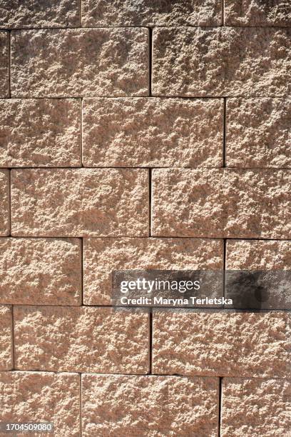 background with beige bricks. universal texture. construction. repair. - newly industrialized country stock pictures, royalty-free photos & images