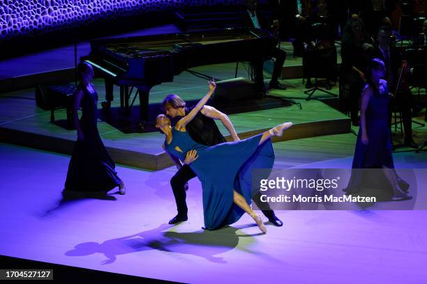 Dancers of the Hamburg Ballett John Neumeier perform during a ceremony in Hamburg's Elbphilharmonie opera house as part of the celebrations on German...
