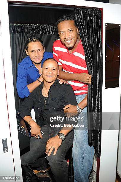 Mauricio Guerrero, Yuri Toro and Elvis Magno of the salsa band Grupo Niche visit the SiriusXM Studios on June 13, 2013 in New York City.
