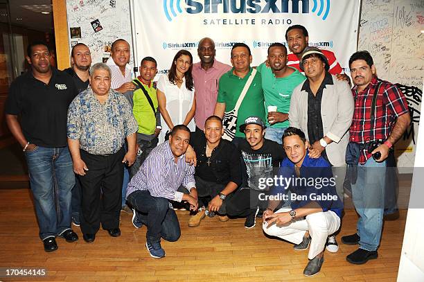 Salsa band Grupo Niche visits the SiriusXM studios to promote their upcoming album, "Tocando el cielo con las manos" on June 13, 2013 in New York...