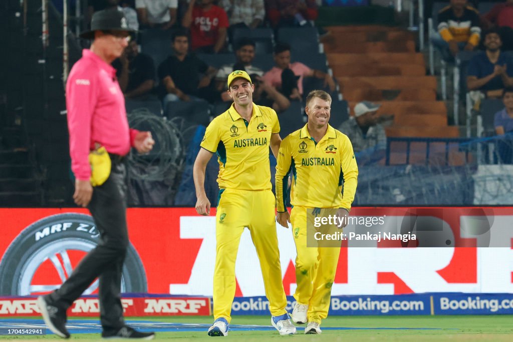David Warner of Australia celebrates after he takes a catch to