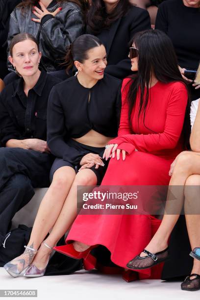 Rosalia and Kylie Jenner attend the Acne Studios Womenswear Spring/Summer 2024 show as part of Paris Fashion Week on September 27, 2023 in Paris,...