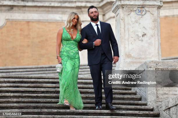 Jon Rahm of Team Europe and his wife Kelley Cahill arrive at the Spanish Steps prior to the 2023 Ryder Cup at Marco Simone Golf Club on September 27,...
