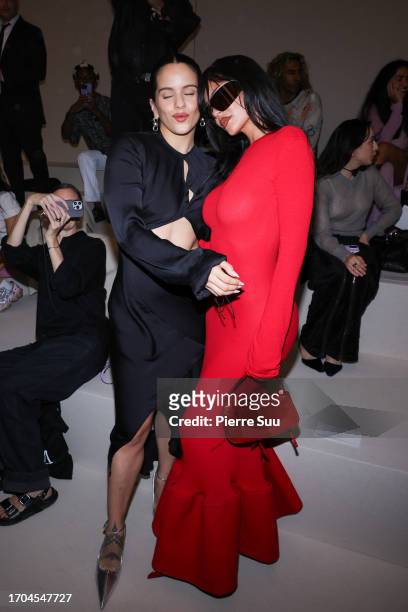 Rosalia and Kylie Jenner attend the Acne Studios Womenswear Spring/Summer 2024 show as part of Paris Fashion Week on September 27, 2023 in Paris,...