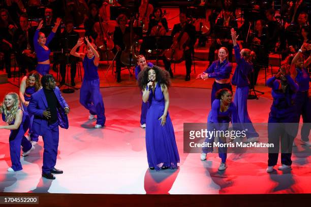 Singers Joshua -JFI- Fielder and Grace -Gege- Owusu and dancers of the Hiphop Academy Hamburg perform during a ceremony in Hamburg's Elbphilharmonie...