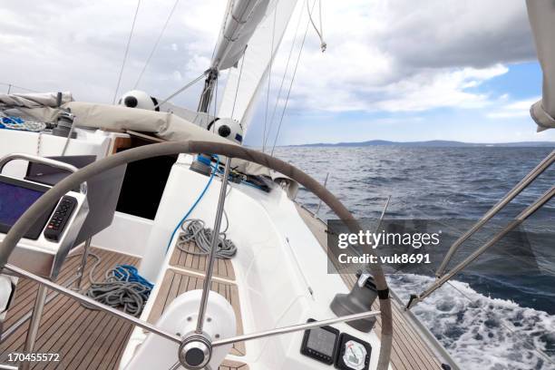 sailing in the adriatic sea - rudder stock pictures, royalty-free photos & images