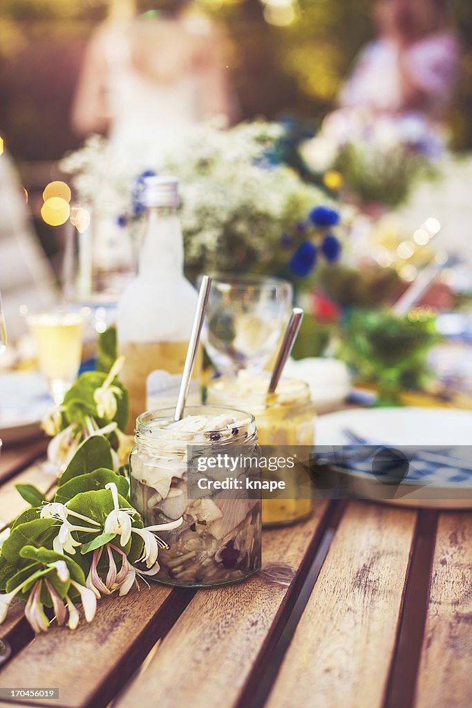 Smörgåsbord with pickled herring and snaps