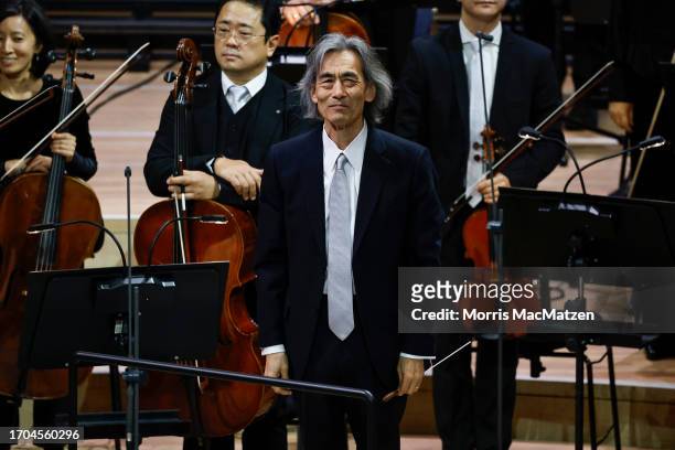 Conductor of the Hamburg Philharmonic State Orchestra Kent Nagano takes applause during a ceremony in Hamburg's Elbphilharmonie opera house as part...