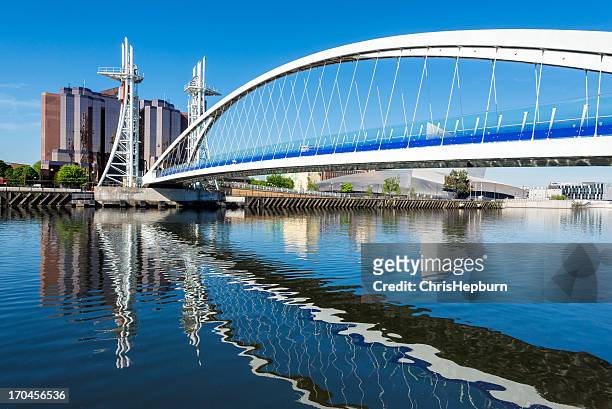 millennium bridge, salford quays, manchester - manchester england stock pictures, royalty-free photos & images