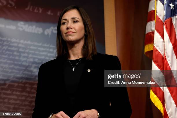Sen. Katie Britt listens during a news conference on border security at the U.S. Capitol Building on September 27, 2023 in Washington, DC. Senate...
