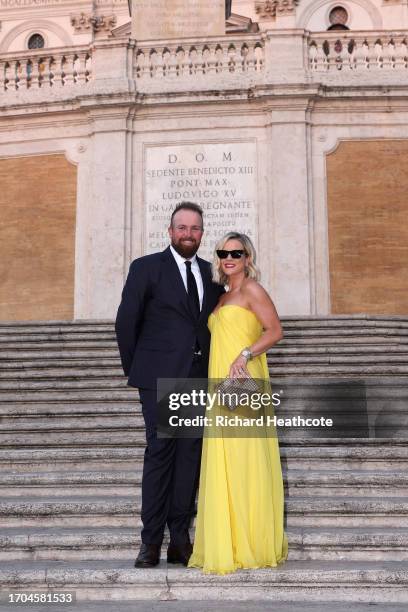 Shane Lowry of Team Europe and wife Wendy Honner pose for photos at the Spanish Steps prior to the 2023 Ryder Cup at Marco Simone Golf Club on...