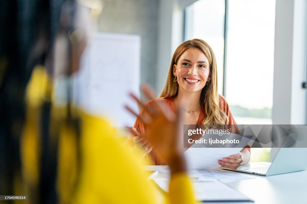 Office manager talks to the new intern
