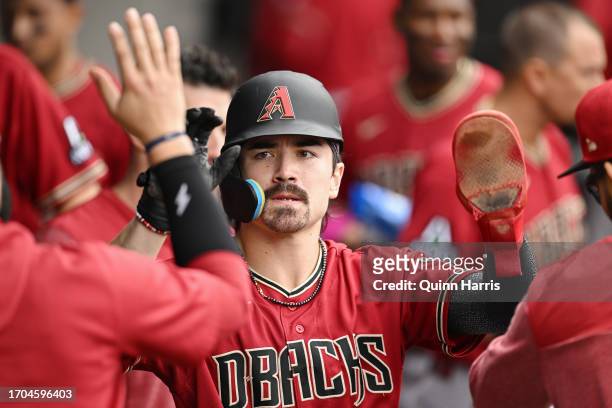 Corbin Carroll of the Arizona Diamondbacks celebrates after scoring in the third inning against the Chicago White Sox at Guaranteed Rate Field on...