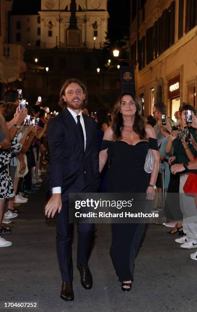 Tommy Fleetwood of Team Europe and wife Clare Fleetwood walk through fans at the Spanish Steps prior to the 2023 Ryder Cup at Marco Simone Golf Club...