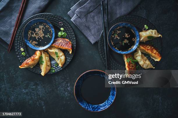 gyoza japanese potstickers - momo stock pictures, royalty-free photos & images