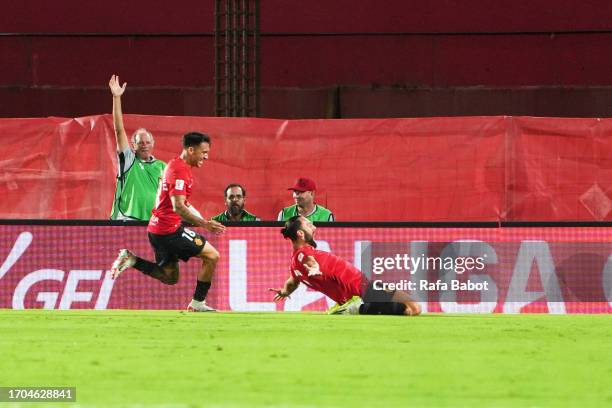 Vedat Muriqi of RCD Mallorca celebrates scoring his team´s first goal during the LaLiga EA Sports match between RCD Mallorca and FC Barcelona at...
