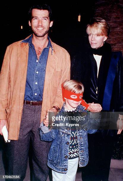 Irish actor Pierce Brosnan with his wife, actress Cassandra Harris and their child, circa 1990.
