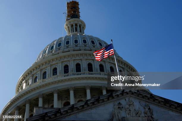 Scaffolding covers the Statue of Freedom atop the U.S. Capitol dome on September 27, 2023 in Washington, DC. House Speaker Kevin McCarthy continues...